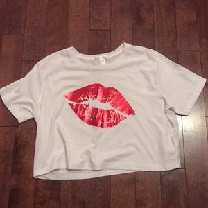White crop-top with a kiss on it.